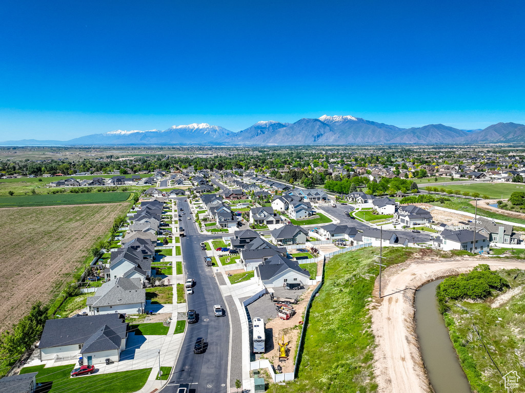 Aerial view of residential area with a mountain backdrop