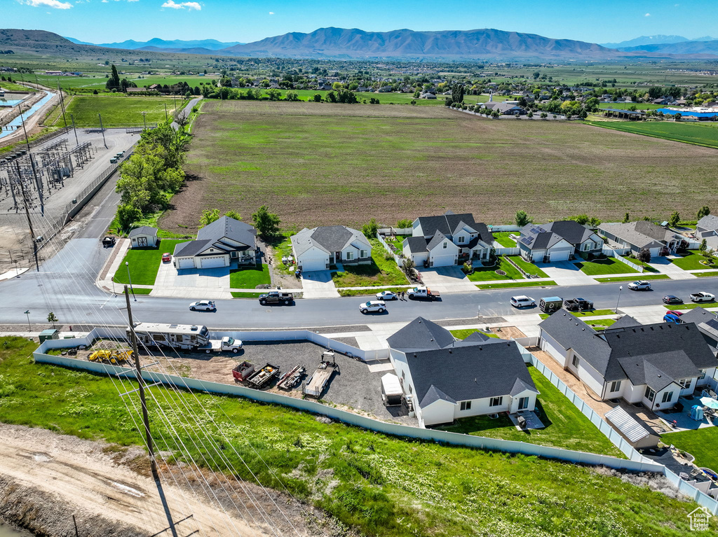 Aerial view of residential area featuring mountains