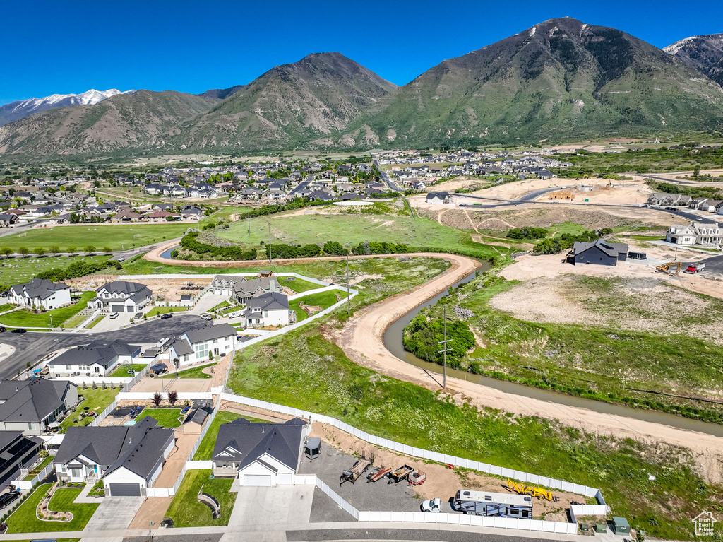 View of mountain background featuring nearby suburban area