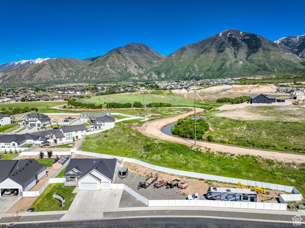 View of mountain background featuring nearby suburban area