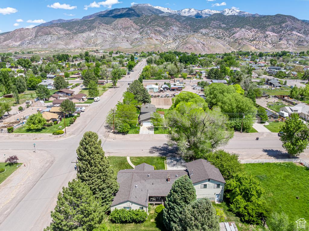 Aerial view of residential area featuring mountains