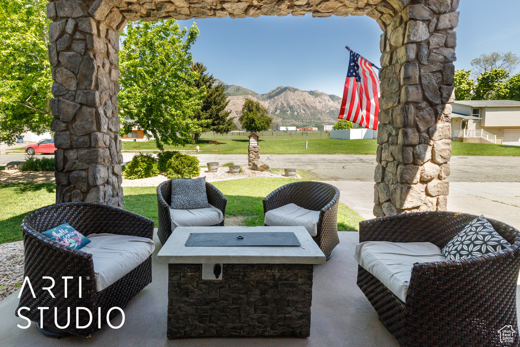View of patio featuring a mountain view