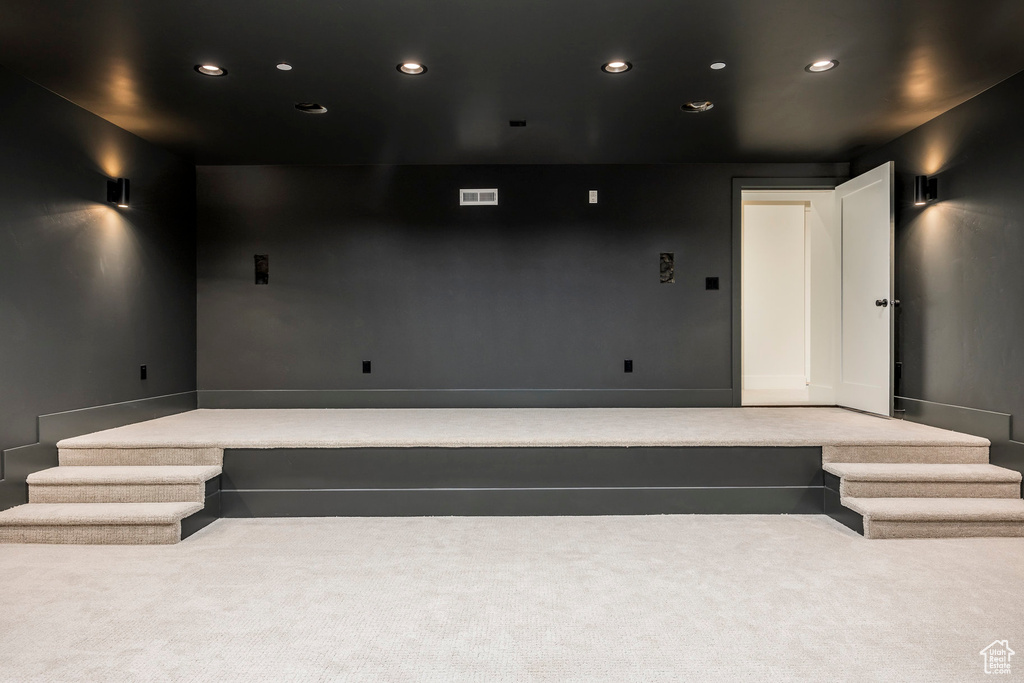 Cinema room featuring carpet, recessed lighting, and baseboards