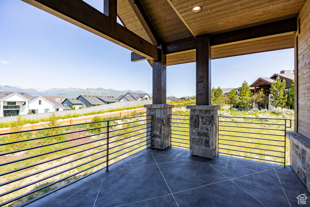 View of patio featuring a residential view and a mountain view