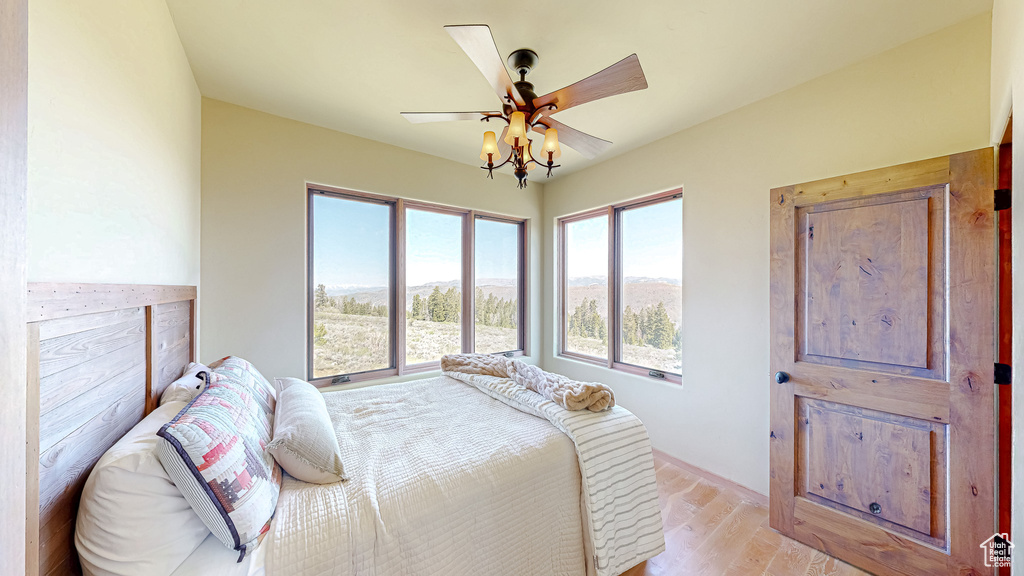 Bedroom featuring light wood finished floors and a ceiling fan