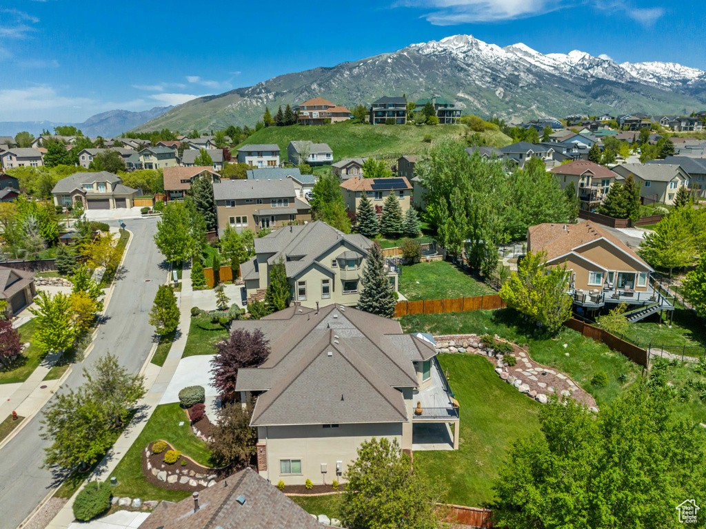 Aerial perspective of suburban area featuring mountains