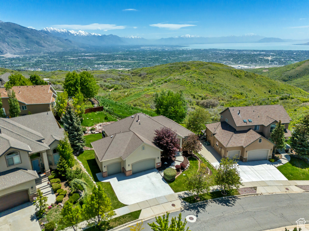 Aerial view of residential area with mountains