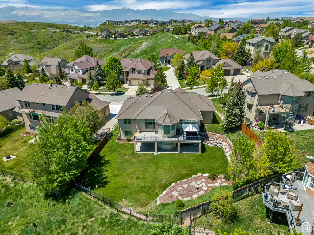 Aerial view of residential area with a mountainous background