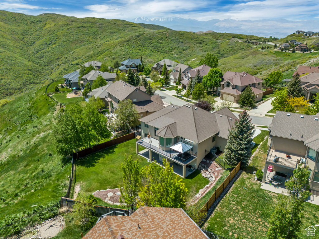Aerial perspective of suburban area with mountains