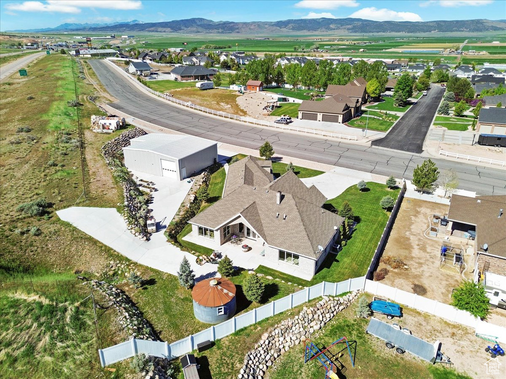 Aerial view of residential area with a mountain backdrop