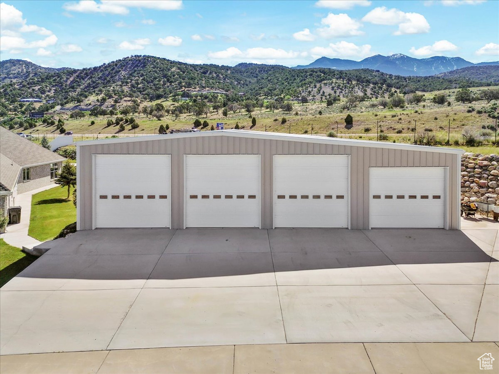 Detached garage with a mountain view
