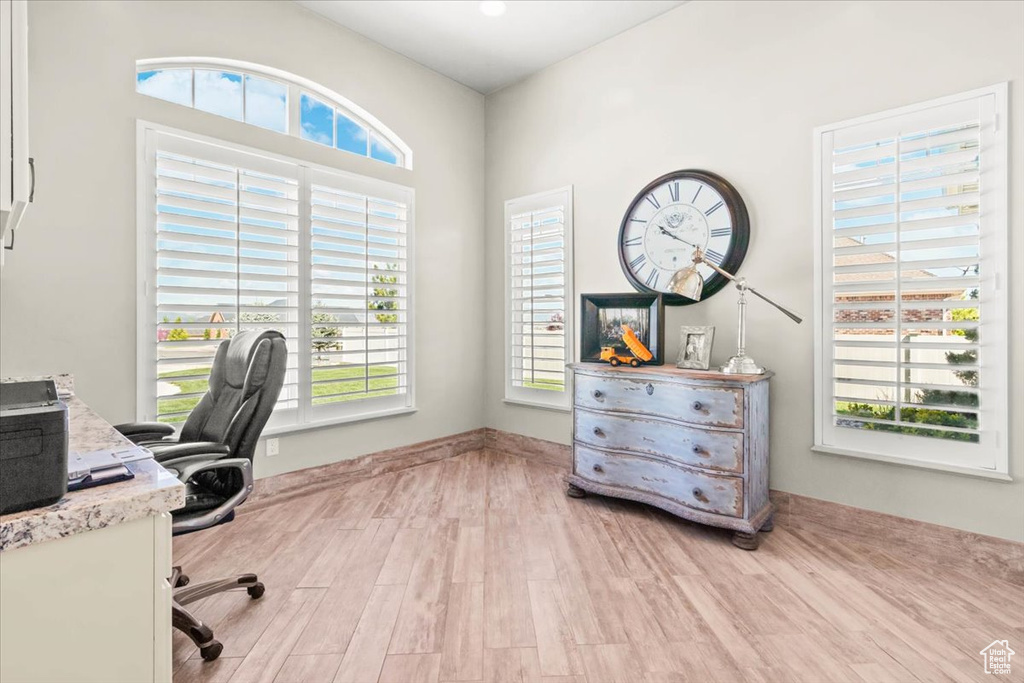 Office area featuring wood finished floors