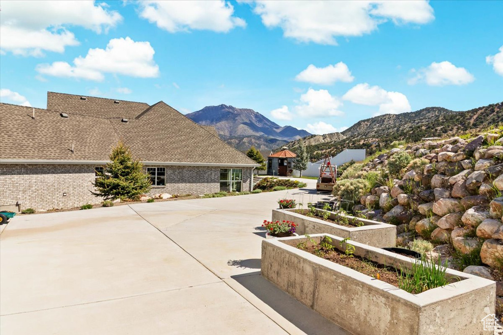 View of patio with a mountain view