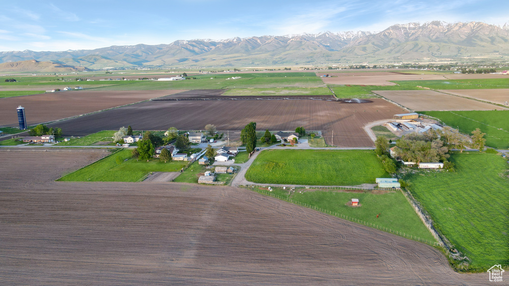 View of property location with a mountain backdrop and rural landscape