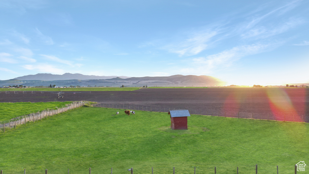 View of yard featuring a mountain view and a rural view