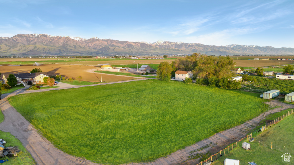 View of mountain background featuring rural landscape