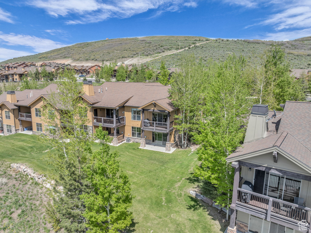 Aerial view of residential area with mountains