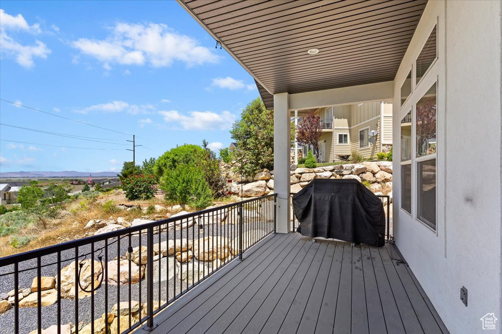 Wooden deck featuring a mountain view