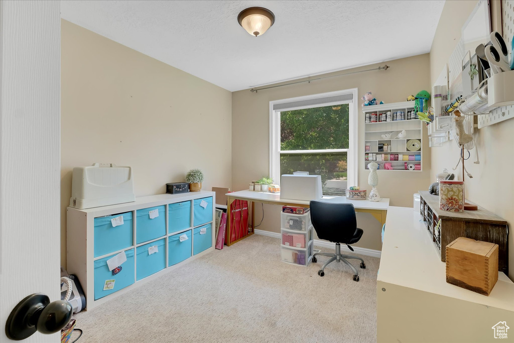 View of carpeted home office