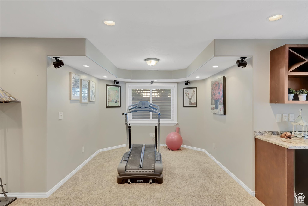 Workout area featuring carpet floors, recessed lighting, and baseboards