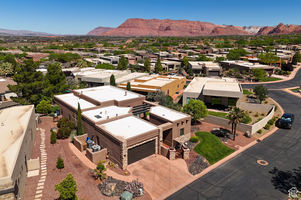 Aerial view of residential area with mountains