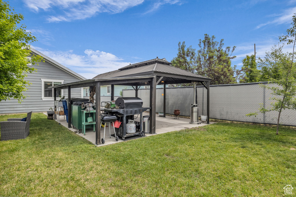 View of yard featuring a gazebo and a patio