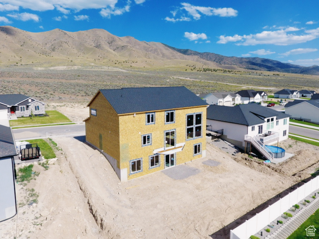 Aerial perspective of suburban area featuring mountains