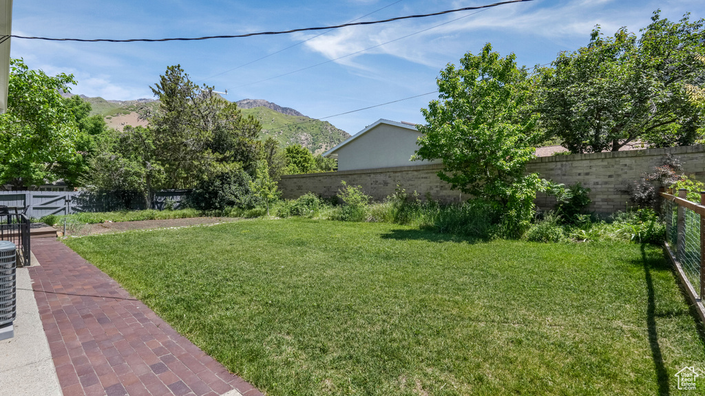 View of yard with a mountain view