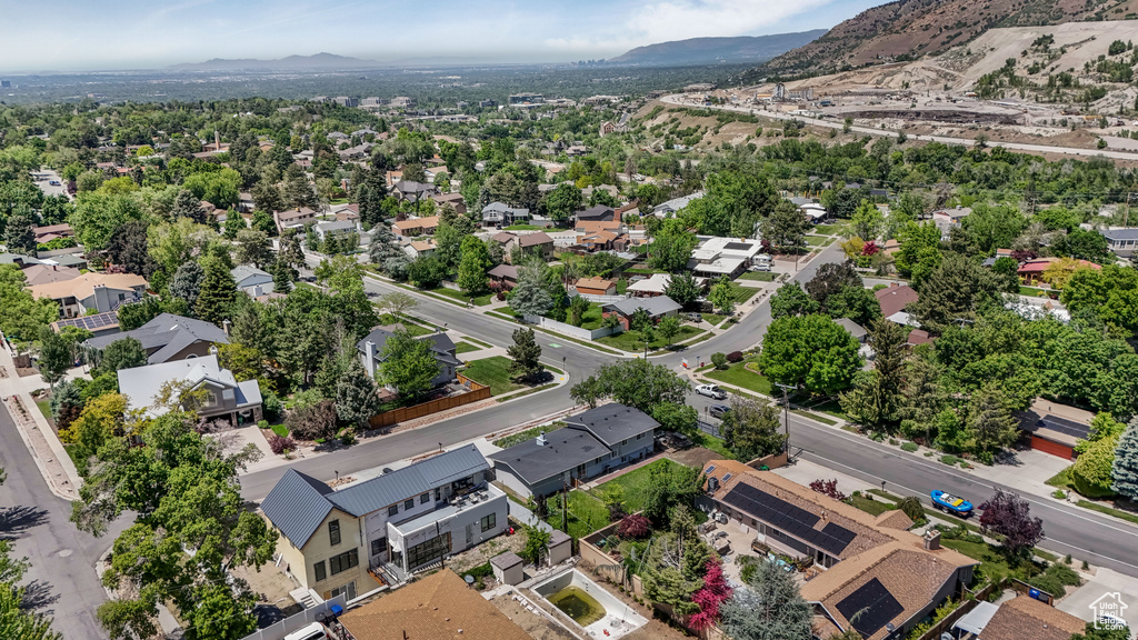 Aerial view of residential area with a mountain backdrop