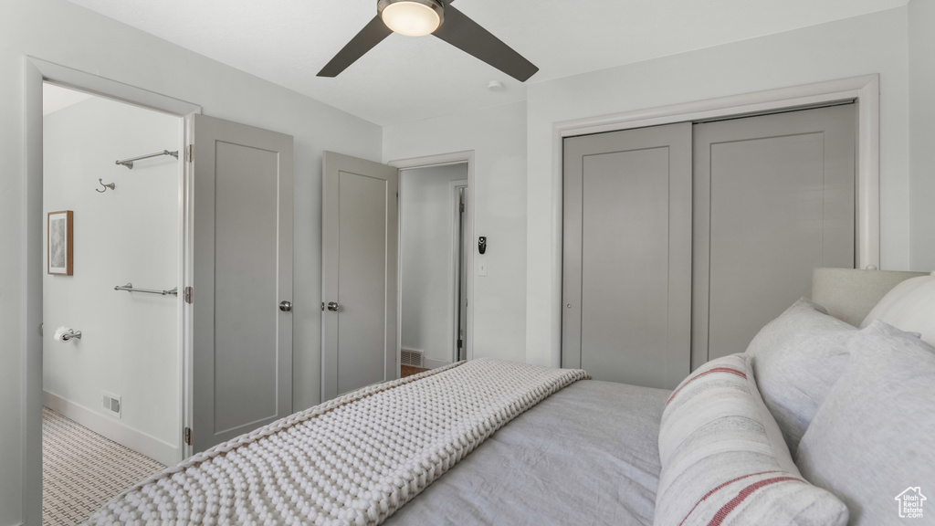 Bedroom featuring baseboards, a closet, and a ceiling fan