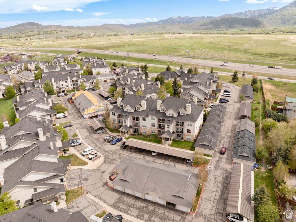 Aerial view of residential area with mountains
