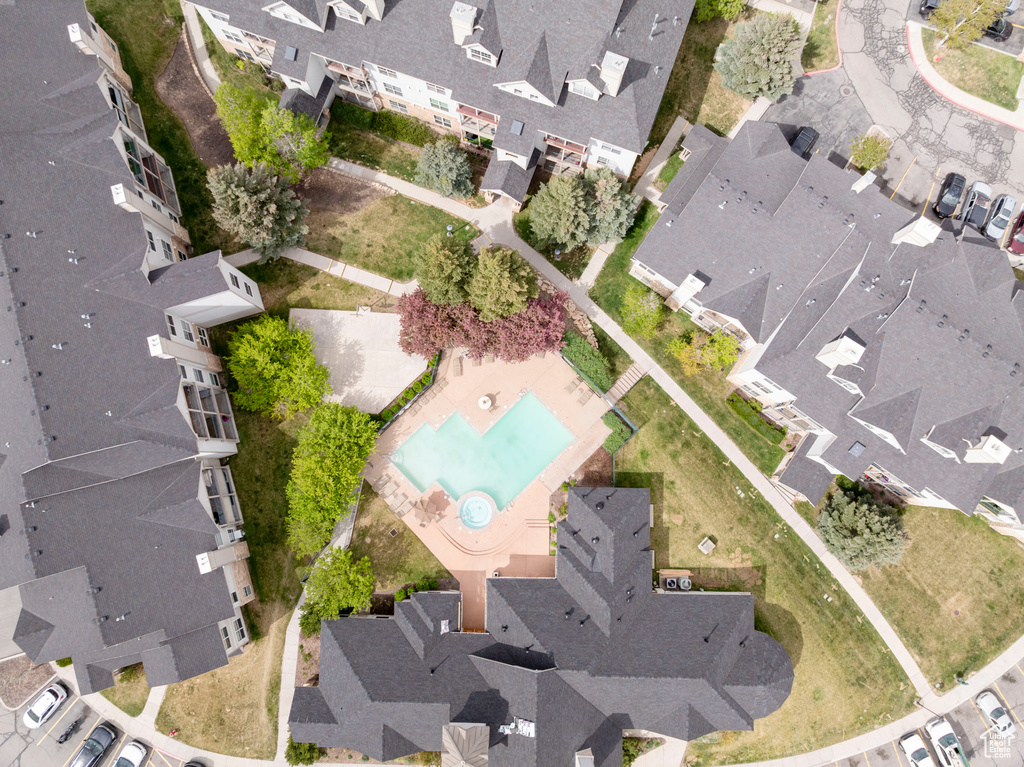 View of property location featuring nearby suburban area and a pool