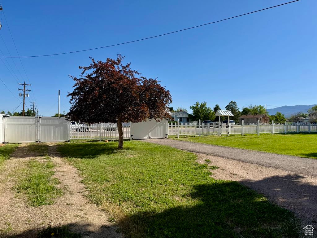 View of yard with a gate