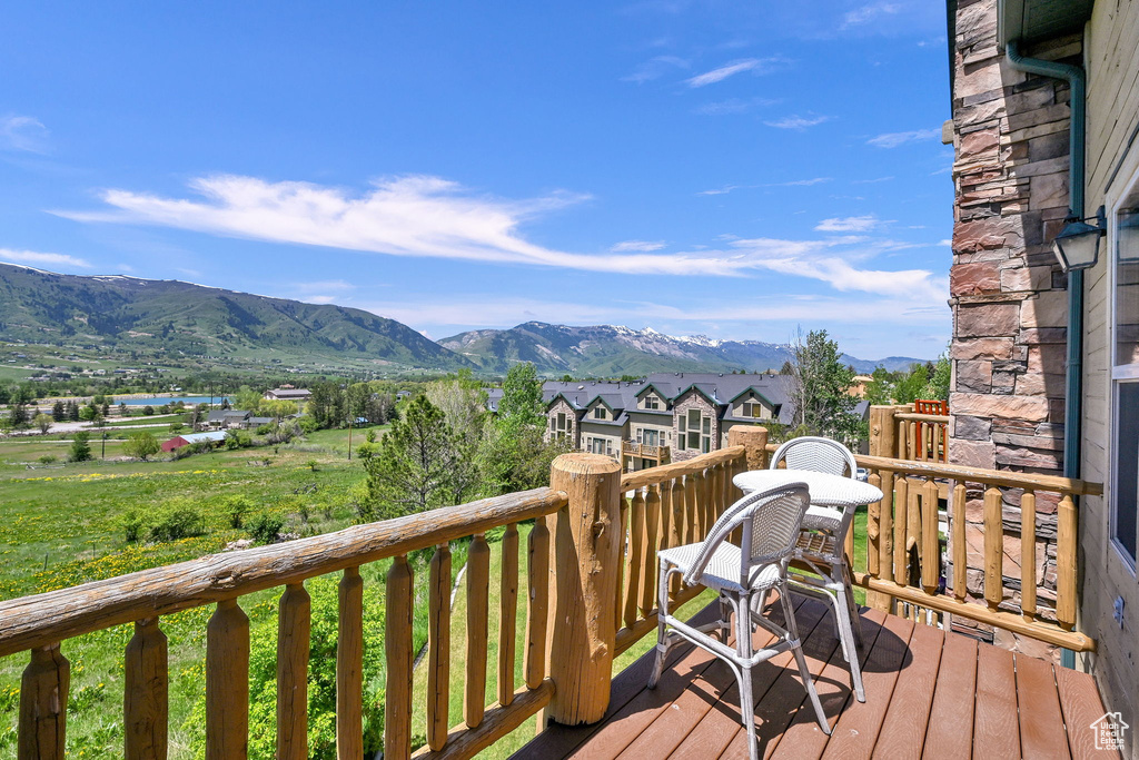 Wooden deck with a mountain view