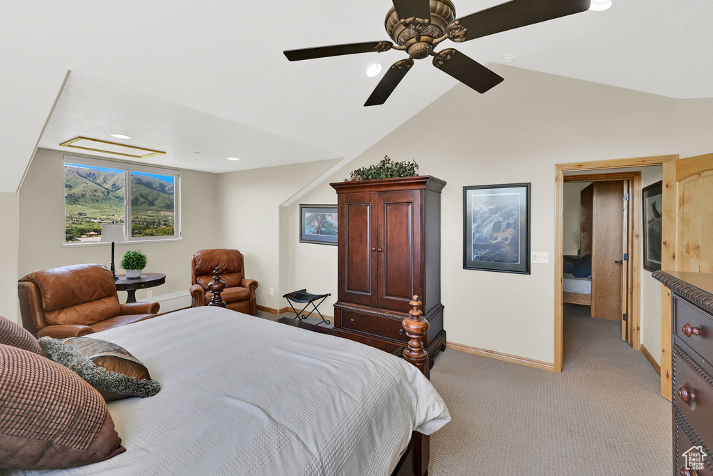 Bedroom with baseboards, light colored carpet, vaulted ceiling, a ceiling fan, and recessed lighting