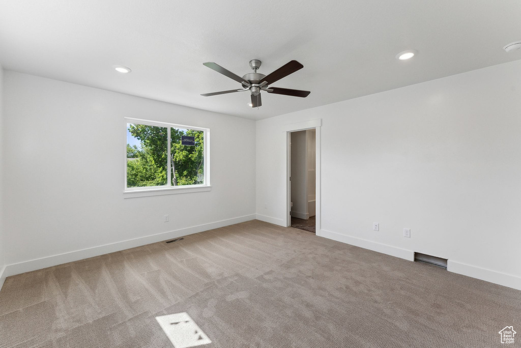 Unfurnished room with ceiling fan, carpet floors, baseboards, and recessed lighting