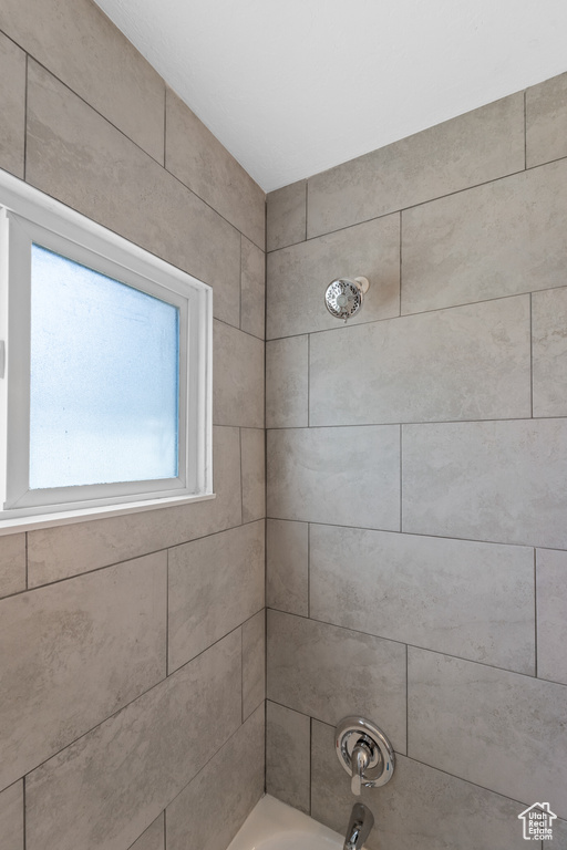 Bathroom featuring tub / shower combination