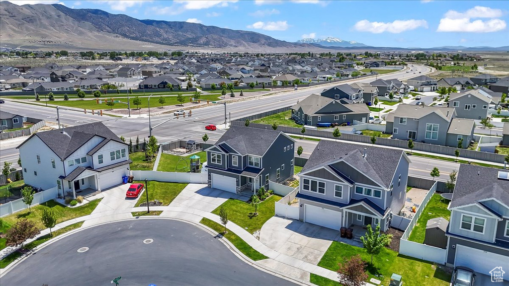 Aerial view of residential area with mountains
