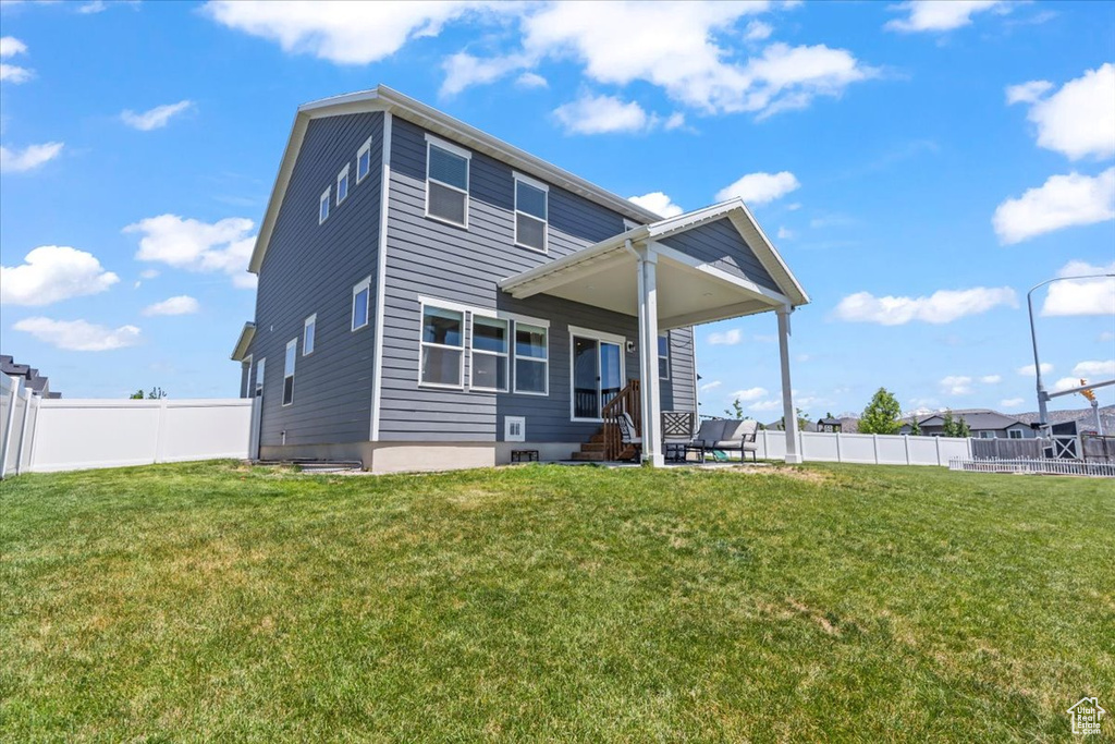 Back of property with entry steps