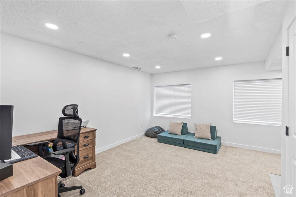 Unfurnished office featuring carpet floors, recessed lighting, and baseboards