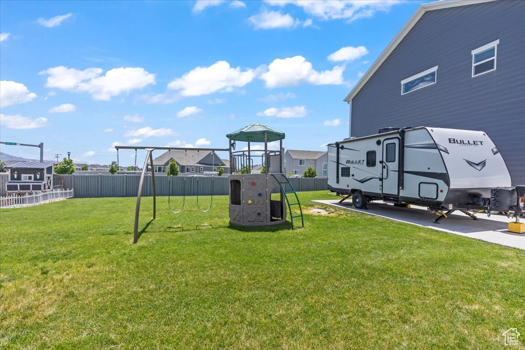 View of yard with a playground
