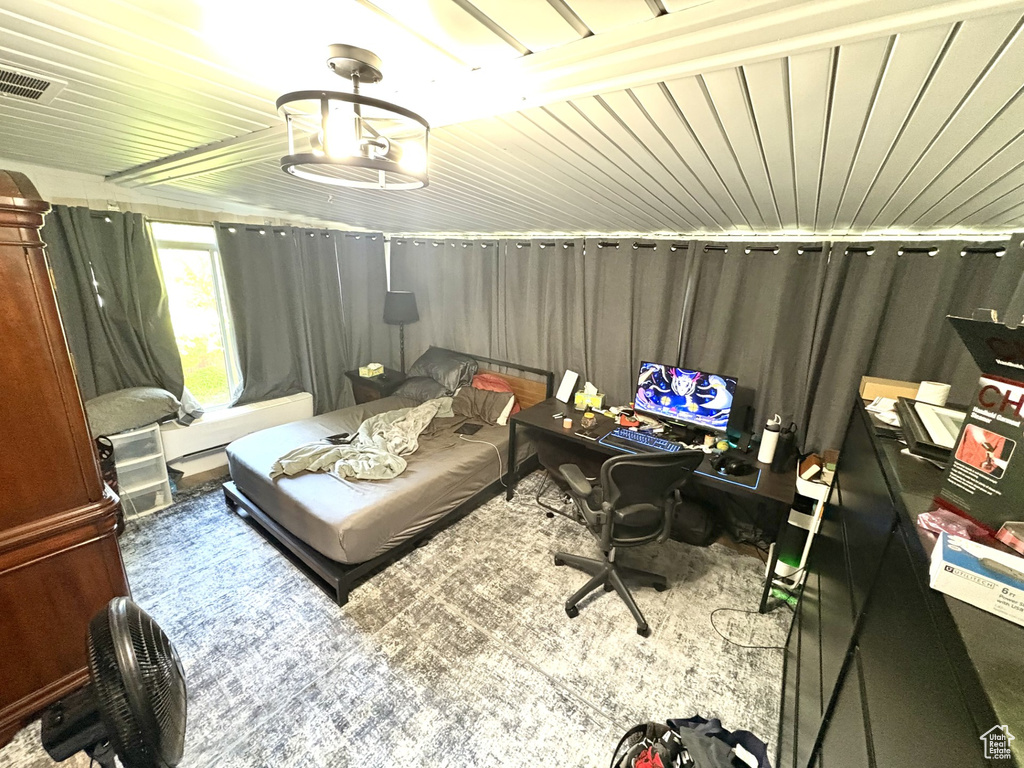 Bedroom featuring an office area