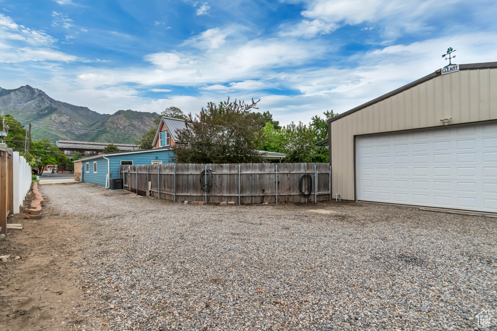 Detached garage with a mountain view