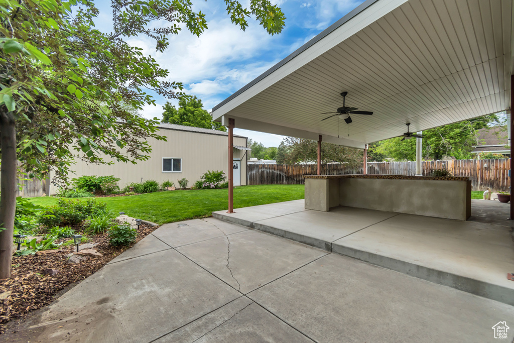 View of patio / terrace with a ceiling fan