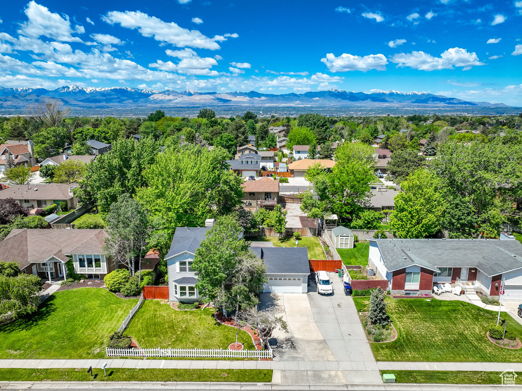 Aerial view of residential area with mountains