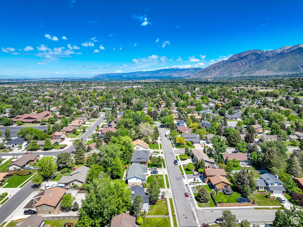 Aerial perspective of suburban area with mountains