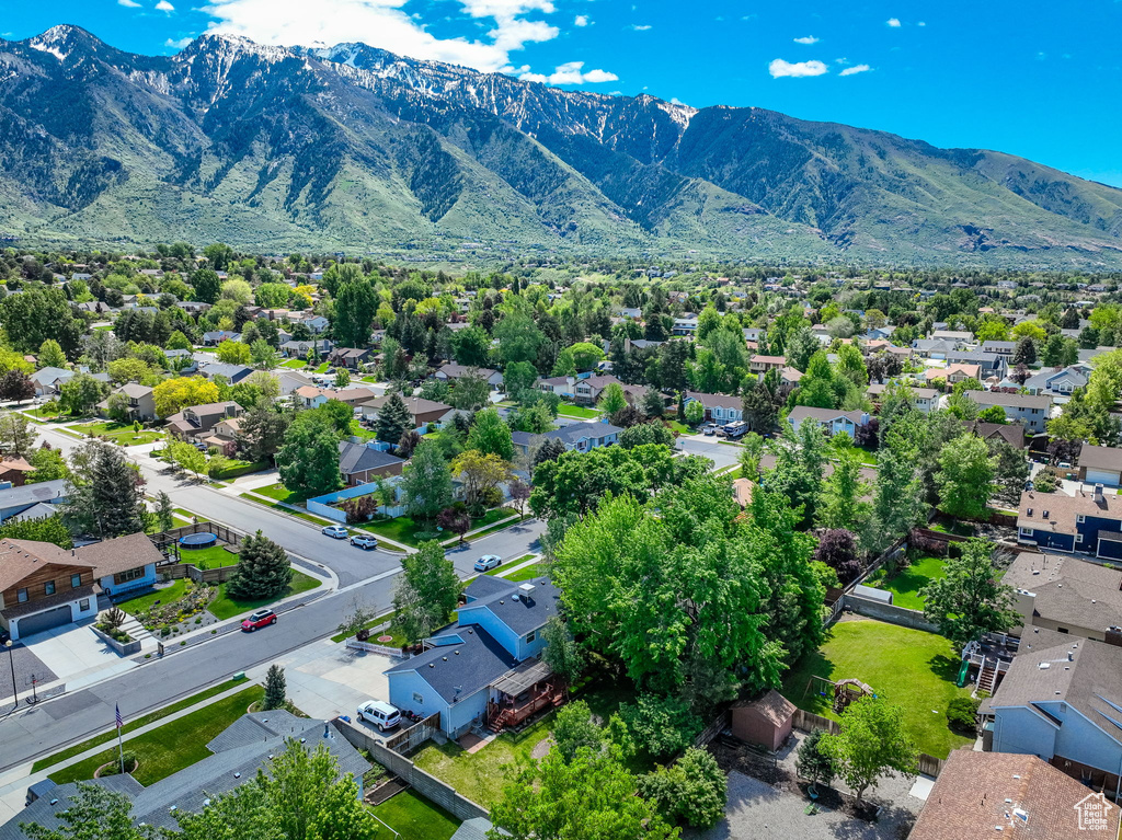 Aerial view of residential area with a mountainous background