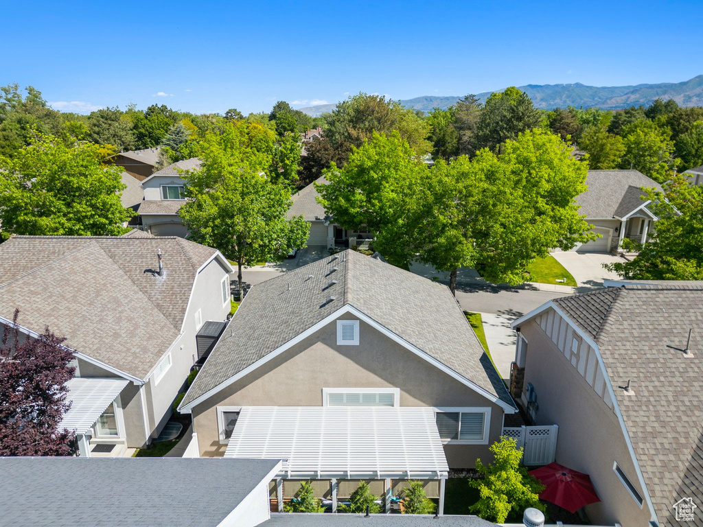 Aerial perspective of suburban area with mountains