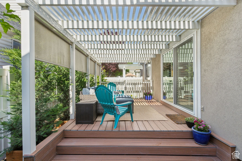 Wooden terrace with a pergola