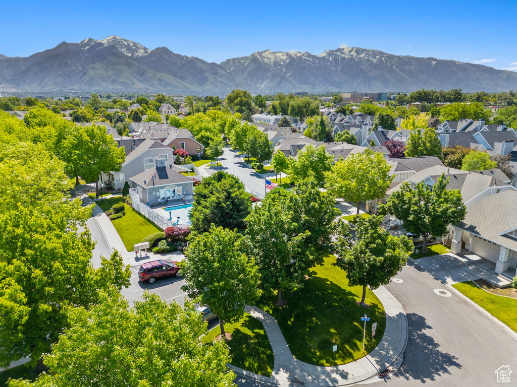 Aerial view of residential area with a mountainous background